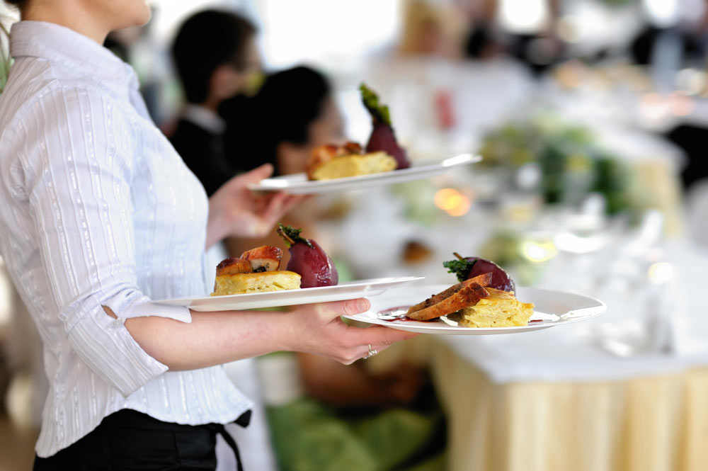 Waitress Carrying Plated Food